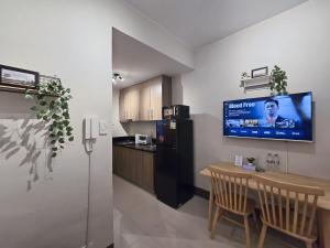 1BR Condotel with Balcony at FAME Residences #FM32-1