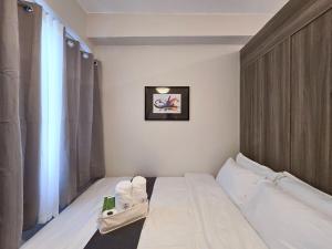 1BR Condotel with Balcony at FAME Residences #FM32-1