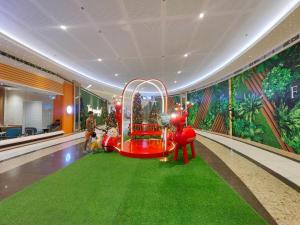 1BR Condotel with Balcony at FAME Residences #FM35-1