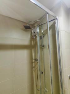 1BR Condotel with Balcony at FAME Residences #FM36-1