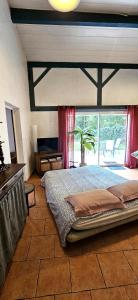 Maisons de vacances Maison calme en bord de riviere : photos des chambres