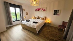 Appartements T4 spacieux et cosy : photos des chambres