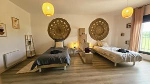 Appartements T4 spacieux et cosy : photos des chambres