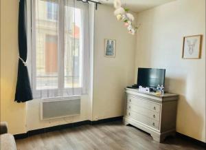 Appartements Coquebert studio confortable proche centre ville : photos des chambres