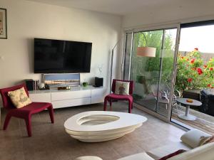 Maisons de vacances Maison familiale avec piscine a Juvignac, 90 m², 6 pers. : photos des chambres