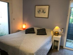 Maisons de vacances Maison familiale avec piscine a Juvignac, 90 m², 6 pers. : photos des chambres