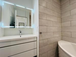 Appartements Ilot lac Central et moderne : photos des chambres