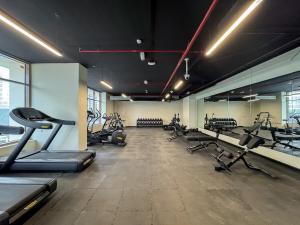 Modern 2BR with Private Terrace, Pool and Gym Access