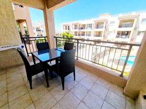 First floor apartment overlooking pool