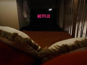 Appartements Le Jacaranda - Suite africaine - Sauna & Netflix : photos des chambres