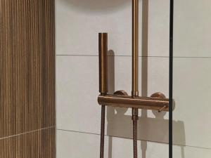 Appartements Le Jacaranda - Suite africaine - Sauna & Netflix : photos des chambres