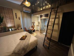 Appartements Le Jacaranda - Suite africaine - Sauna & Netflix : Appartement 1 Chambre