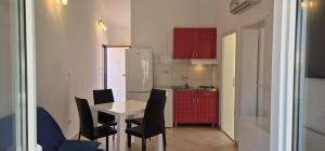 APARTMENTS BRUNO 3 - two-room penthouse apartment - wonderful view of the sea - the best location, first row to the beach - 10 minutes from Supetar ferry port - free secured parking - facilities nearby