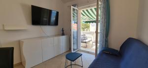 APARTMENTS BRUNO 3 - two-room penthouse apartment - wonderful view of the sea - the best location, first row to the beach - 10 minutes from Supetar ferry port - free secured parking - facilities nearby