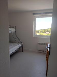 Appartements Au pied des piste T4 51m2 avec garage Le Pavin : photos des chambres