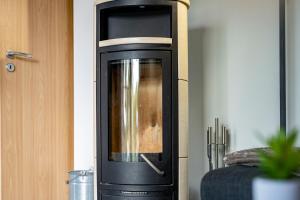 Ferienhaus Aurora mit Kamin und Terrasse