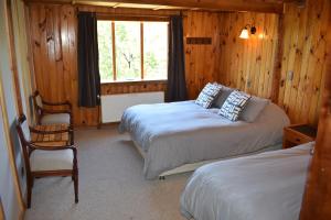 Hostal y Cabañas "El Coigüe"