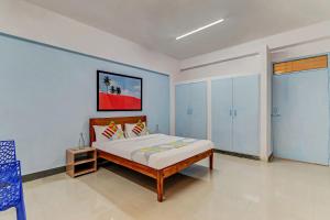Capital O Elite Stay Jp Nagar Near SRI SATHYA GANAPATHI SHIRDI SAIBABA Temple
