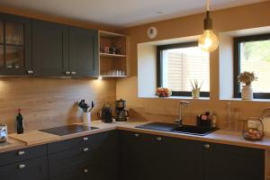 Maisons de vacances L-Ecurie - Nature et SPA prive : photos des chambres