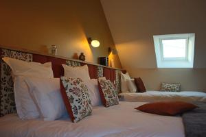 Maisons de vacances L-Ecurie - Nature et SPA prive : photos des chambres