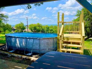 Tequila Sunrise hot tub lake view firepit pool