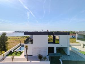 NEW! Luxury Villa Golden Hour near the beach with heated pool and sauna - TA Leut agency