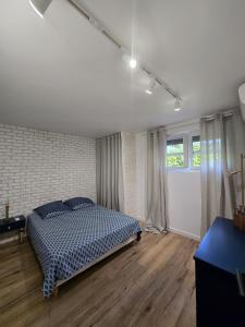 Maisons de vacances Partie privative dans villa 6 personnes piscine climatise : photos des chambres