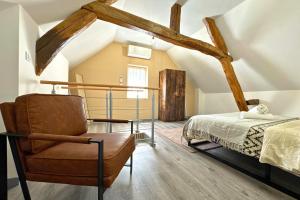 Appartements L-Atelier - By BEST KEYS - Duplex Haut de Gamme - Entierement Climatise - Centre-Ville - Netflix & WiFi Fibre - Machine a Cafe Nespresso - Check-in Autonome - Parking Gratuit a Proximite - Calme & Confort Premium : photos des chambres