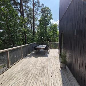 Large modern house with a hot tub