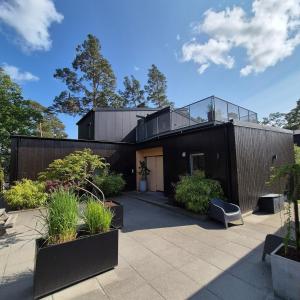 Large modern house with a hot tub