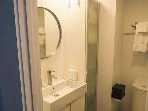 Double Room with Balcony - Main Building 3 room in Stones Throw