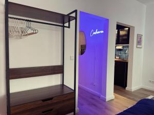 CuxHeaven - modernes Studio-Apartment direkt am Meer mit 65 Zoll TV und Tiefgarage in Duhnen