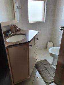 Apto com cozinha e lavanderia