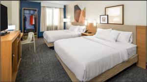 Queen Room with Two Queen Beds room in Astoria Hotel & Suites - Glendive