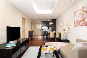 Mystic Haven King Bed Suite with Balcony & City Views