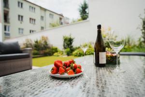 Luxusní zahradní rezidence - 3 min od centra, 2 ložnice, zahrada, 117 m2