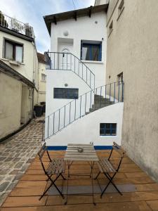 Appartements New Cosy Studio centre-ville Orsay, calme et confort : photos des chambres