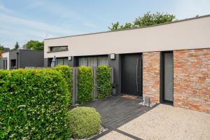 Villas Villa de standing piscine 10 pers : Villa - Vue sur Jardin