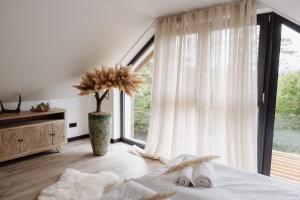 W szczerym lesie - Domek z sauną i jacuzzi w lesie nad Jeziorem Mucharskim