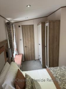 Lakeside Retreat with hot tub and fishing peg on Osprey Rise at Tattershall Lakes Country Park