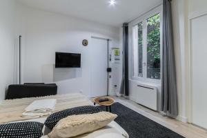 Appartements Studio neuf Porte de Saint Cloud Paris 16 - 4P : photos des chambres