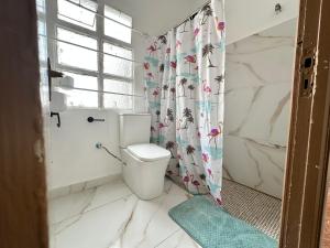 Habitación individual con baño compartido