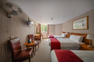 Quadruple Room room in The Clarendon Hotel