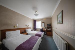 Crown Triple Room room in The Clarendon Hotel