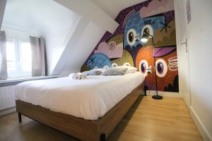Appartements La Mansarde - Cozy T2 - Disney, Gare, Hypercentre : photos des chambres