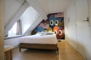 Appartements La Mansarde - Cozy T2 - Disney, Gare, Hypercentre : photos des chambres
