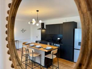 Appartements Les Jardins du Theatre - Elegance, Bois & Design : photos des chambres
