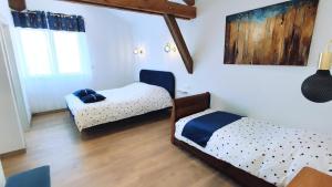 Maisons de vacances La hal-te verte : photos des chambres