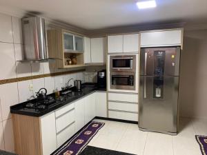 Sobrado com 6 suítes para temporada e show rural