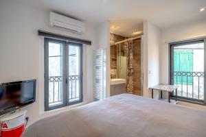 Villas Magnifique Maison de Village climatisee, terrasse : photos des chambres
